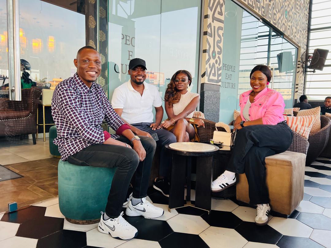 Four friends sitting together at a LinkUp Lagos hangout